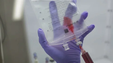IV drip bag injected with vitamins Stock Footage 89737965