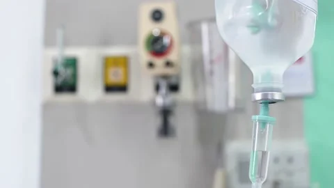 Iv drip dropping continuously rate at hospital ward. Stock Footage 153355107