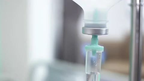 Iv drip dropping continuously rate at hospital ward, close-up shot. Stock Footage 154614577