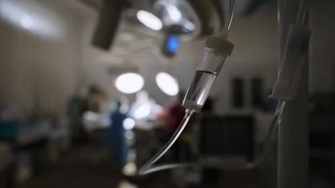 IV drip during surgery. Operating room in the hospital. Stock Footage 293452532