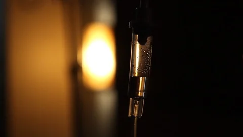 IV Drip- ECU Backlit Sepia-Style Stock Footage 101348845