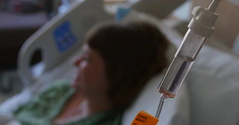 IV Drip Patient in bed out of focus Stock Footage 41752549
