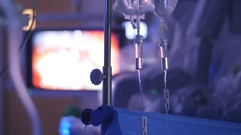 IV dripping during DaVinci Surgery Stock Footage 96249167