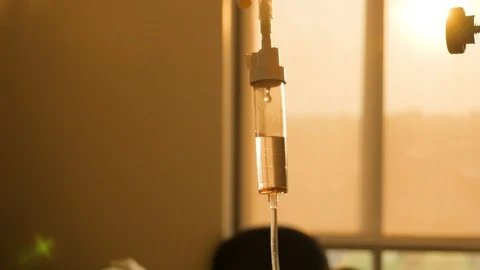 Iv dripping with sun setting in the background Stockbeeldmateriaal 93665563
