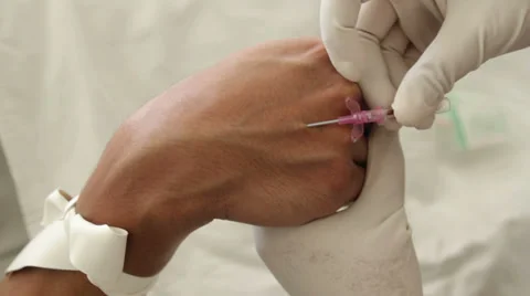 IV Fluid Needle Insertion Stock Footage 35230474