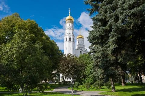 Ivan the Great Bell through the leaves of trees in the Tainitski garden Stock Photos