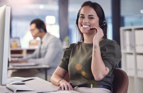 Ive got the answer to your question. a young female call center agent at work. Foto stock