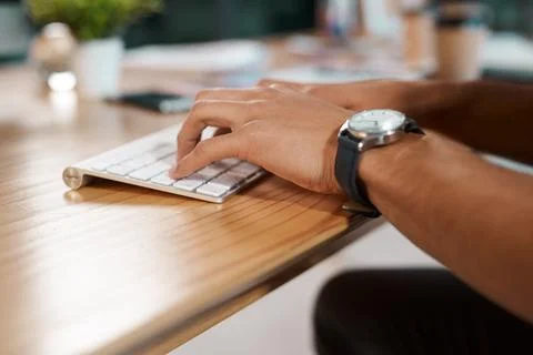 Ive had to learn how to type fast. an unrecognizable businessman sitting alone Stock Photos