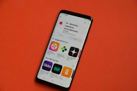 IVI mobile application is installed on a smartphone. IVI program on a mobile Stock Photos