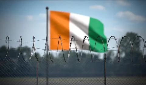 Ivory Coast - Flag and Barbed Wire Fence - 3D illustration Stock Illustration