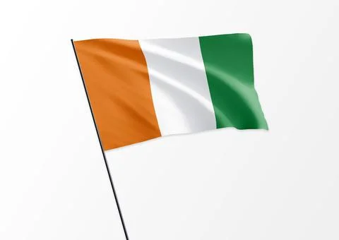 Ivory Coast flag flying high in the isolated background Ivory Coast independ Stock Illustration