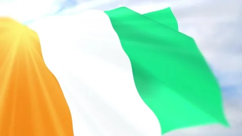 Ivory Coast Flag Seamless Loop 4k 60fps on Sky Background Stock Footage 340625366
