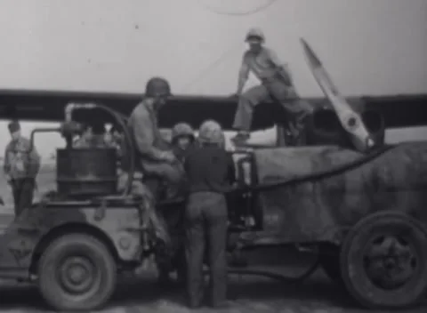 IWO JIMA - 1945: Ground crew services equipment on Iwo Jima Stock Footage 342981964