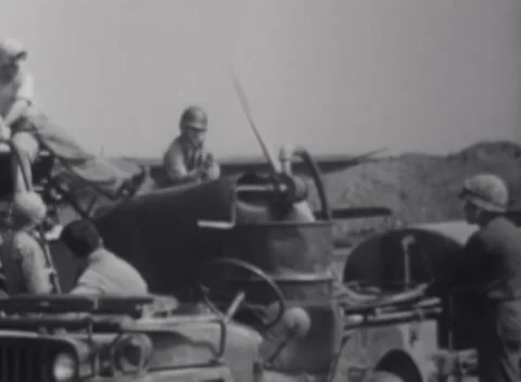 IWO JIMA - 1945: Ground crew — Crewman climbs an equipment mount on Iwo Jima Video stock 342981978