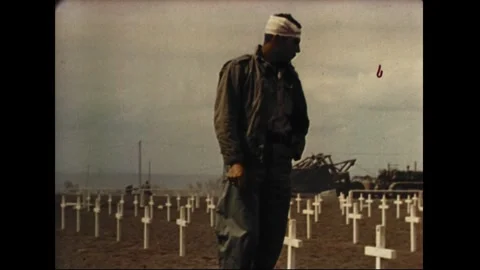 IWO JIMA - 1945: Portrays a wounded man at the marine cemetery on iwo jima Stock Footage 339215269