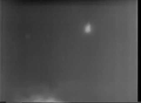 IWO JIMA, JAPAN - 1945: Dump fire - Point of Light above Glowing Mass Stock-Footage 343787571