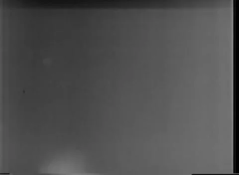 IWO JIMA, JAPAN - 1945: Dump fire - Small Light Low in Night Sky Stock Footage 343787577