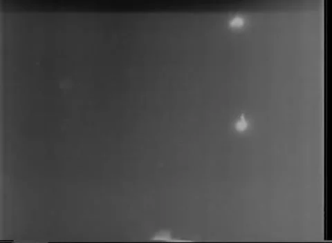 IWO JIMA, JAPAN - 1945: Dump fire - Soft Blob Glows At Upper Right Video stock 343787601