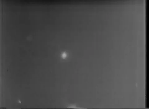 IWO JIMA, JAPAN - 1945: Dump fire - Single Point Of Light Sits At Centre Stock-Footage 343787603