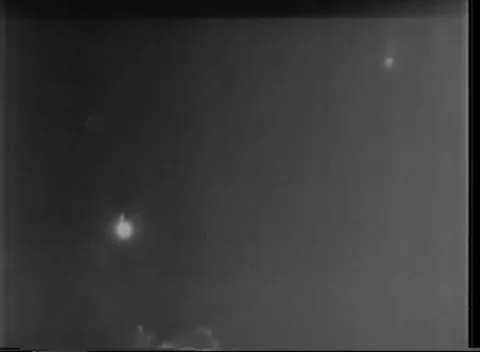 IWO JIMA, JAPAN - 1945: Dump fire - Point Of Light With Short Downward Stock-Footage 343787616