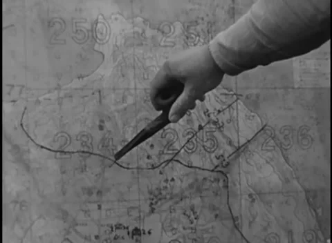 IWO JIMA, JAPAN - 1945: Map plotting - Pointer Marks Positions on a Contour Map Stock Footage 344504042