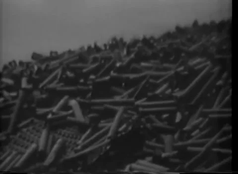 IWO JIMA, JAPAN - 1945: Shell dump - Shell casing mound rises toward the sky Stock-Footage 344503880