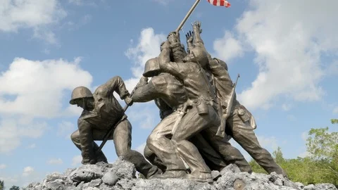 Iwo Jima Memorial War Statue American Soldier Flag Medium Shot3 Slow Motion 4K Stock Footage 123661895