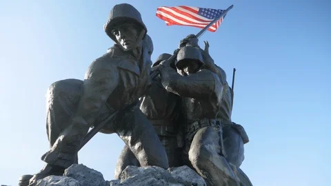 Iwo Jima Memorial War Statue American Soldier Flag Medium Shot4 Slow Motion 4K Stock Footage 123668830