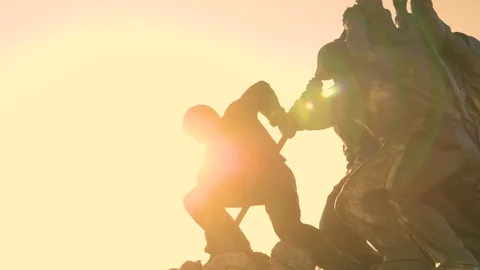Iwo Jima Memorial War Statue American Soldier Flag Flare Warm3 Slow Motion 4K Stock Footage 123673387