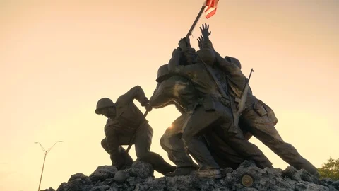 Iwo Jima Memorial War Statue American Soldier Flag Flare Warm2 Slow Motion 4K Stock Footage 123673869