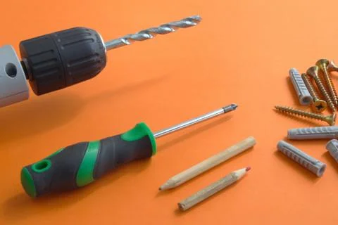 IY tool set consisting of screws, dowels, screwdriver and drill Stock Photos