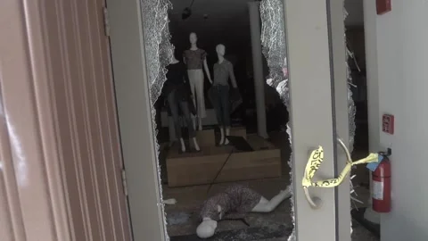J. Crew Store front vandalized following looting and riots in Washington DC Stock Footage 131549683