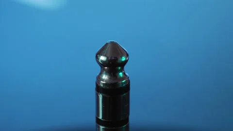 Jack 6.3 mm mono audio plug rotates on a blue background. Stock Footage 171040002