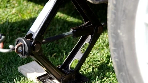 Jack the car Stock Footage 49208329