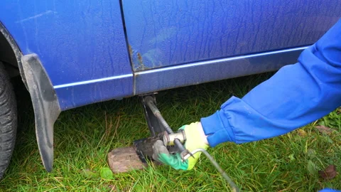 Jack up the car Stock Footage 221621077