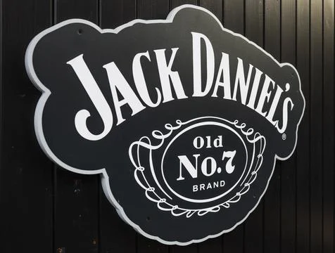 Jack Daniel Old No. 7 sign on a black wall with vintage design. London, UK, 2 Stock Photos