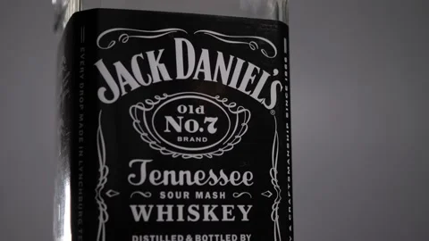 Jack Daniel's Bottle (Macro), Tilt Down Stock Footage 220755547