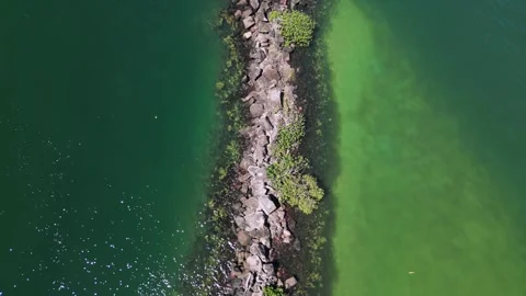 Jack Evans boat harbour man-made coastal rockwall to provide a safe inlet Stock Footage 260446392