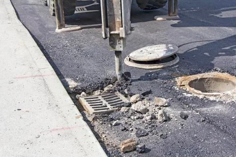 Jack hammer breaking Stock Photos