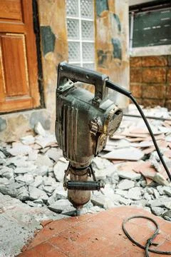 Jack hammer machine break concrete floor for renovation Stock-Fotos