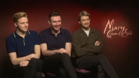 Jack Lowden, James McArdle and Joe Alwyn attend 'Mary Queen of Scots' Junket Stock Footage 102365892