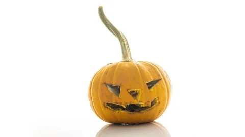 Jack mask on white background rotting in time lapse, rotting pumpkin, mold Stock Footage 250586114