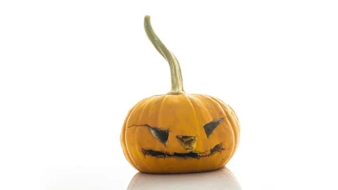 Jack mask on white background rotting in time lapse, rotting pumpkin, mold Stock Footage 251618788