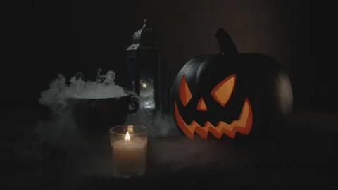 Jack O' Lantern and Smoking Cauldron Surrounded in Fog in Slow-Mo | Halloween Stock Footage 138334933