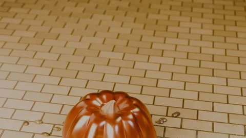 Jack-o'-lantern approached through golden spirit lights on path, 4K Stock Footage 346120289