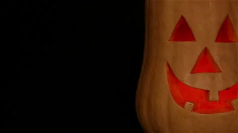 Jack-O-Lantern in the Dark Background 4. Looped Stock Footage 64974485