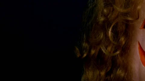 Jack-O-Lantern in the Dark Background in the red wig left to right 7. Stock-Footage 64974638