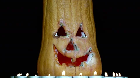 Jack-O-Lantern in the Dark Background 2. Looped Stock Footage 64974664