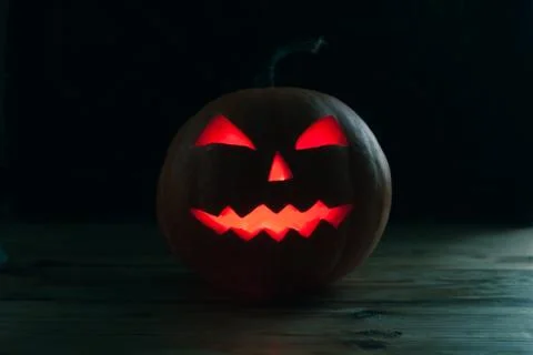 Jack o lantern in the dark, red eyes, Stock Photos