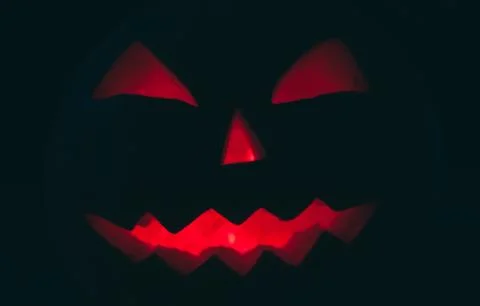Jack o lantern in the dark, red eyes, Stock Photos